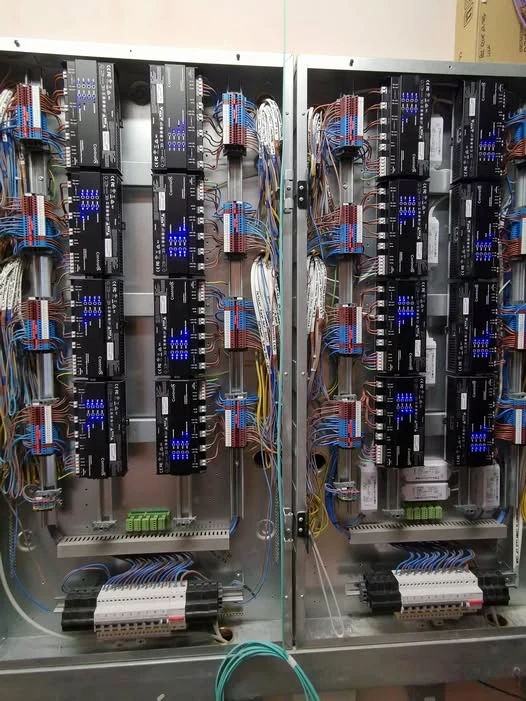 Control4 lighting panels installed in an equipment cabinet