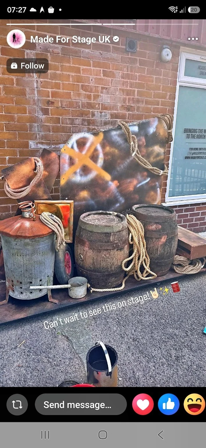 Distressed scenic panels, ropes and barrel props during fabrication